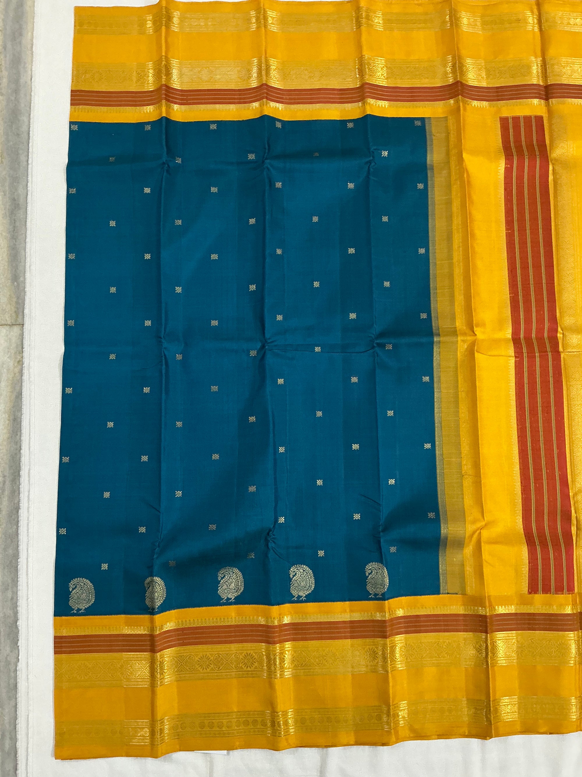 MYTHILI:  PETTU BUTTA KANJIVARAMS (Burnt Copper Sulphate Blue)