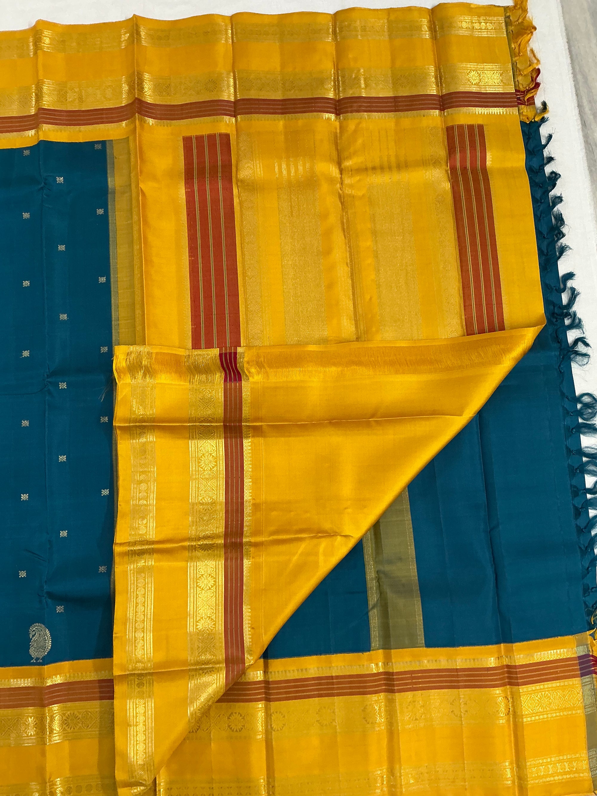 MYTHILI:  PETTU BUTTA KANJIVARAMS (Burnt Copper Sulphate Blue)