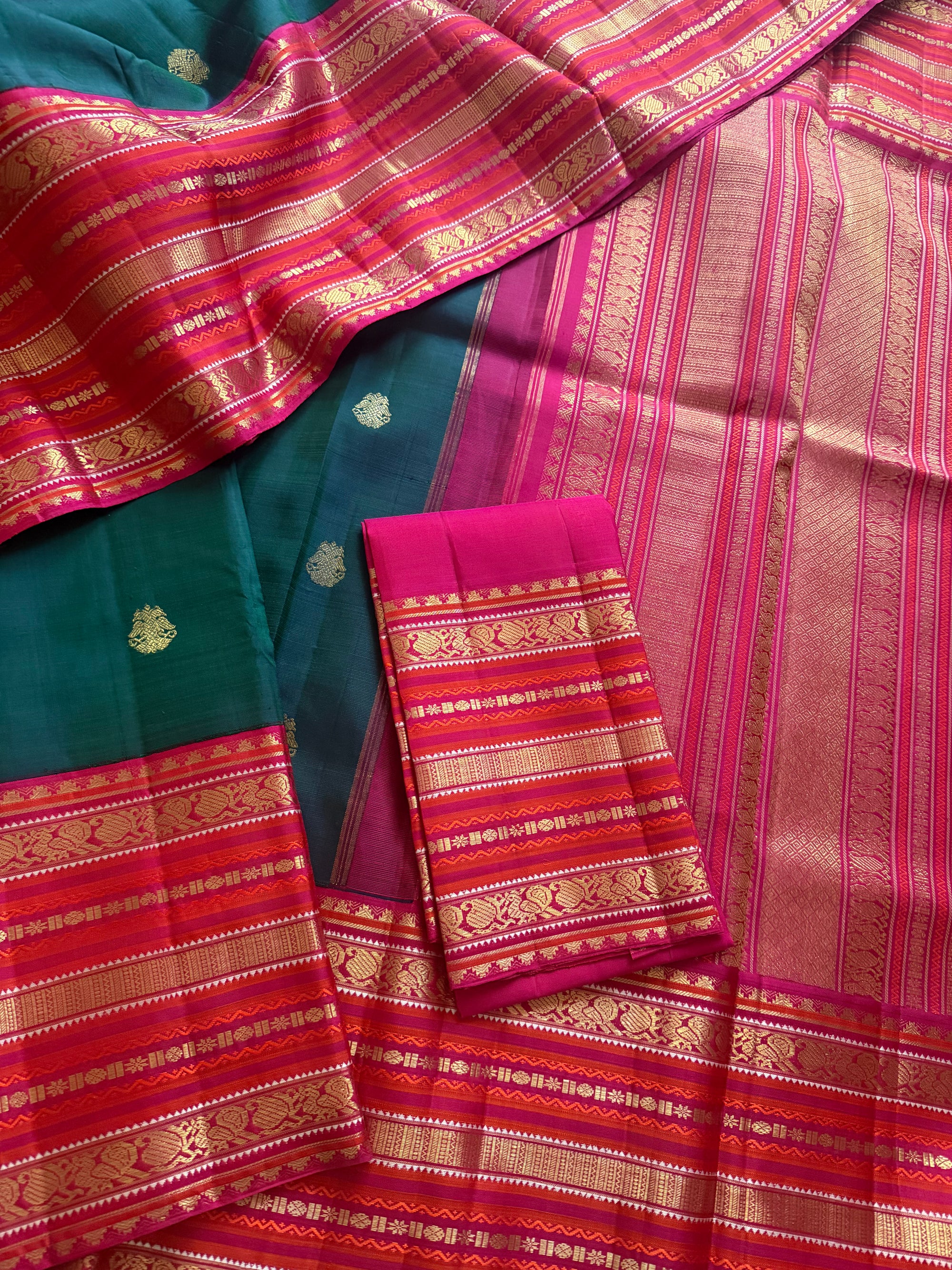 MYTHILI:  Vintage Kanjivaram Silk with Adukkupettu borders (Peacock Green + Pink)