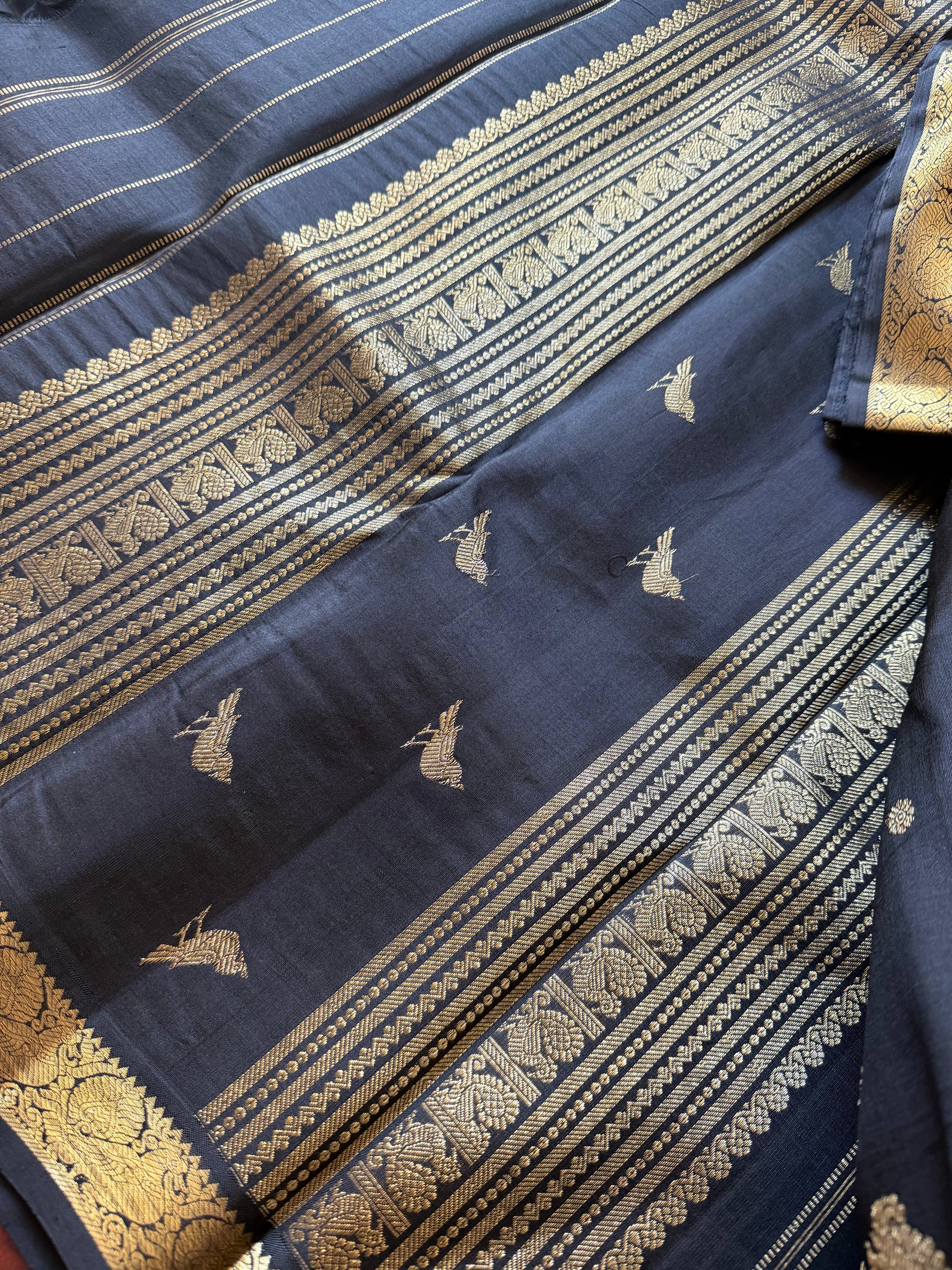 SWARA: Kanjivaram Silk (Black Self borders with Beetu Butta)