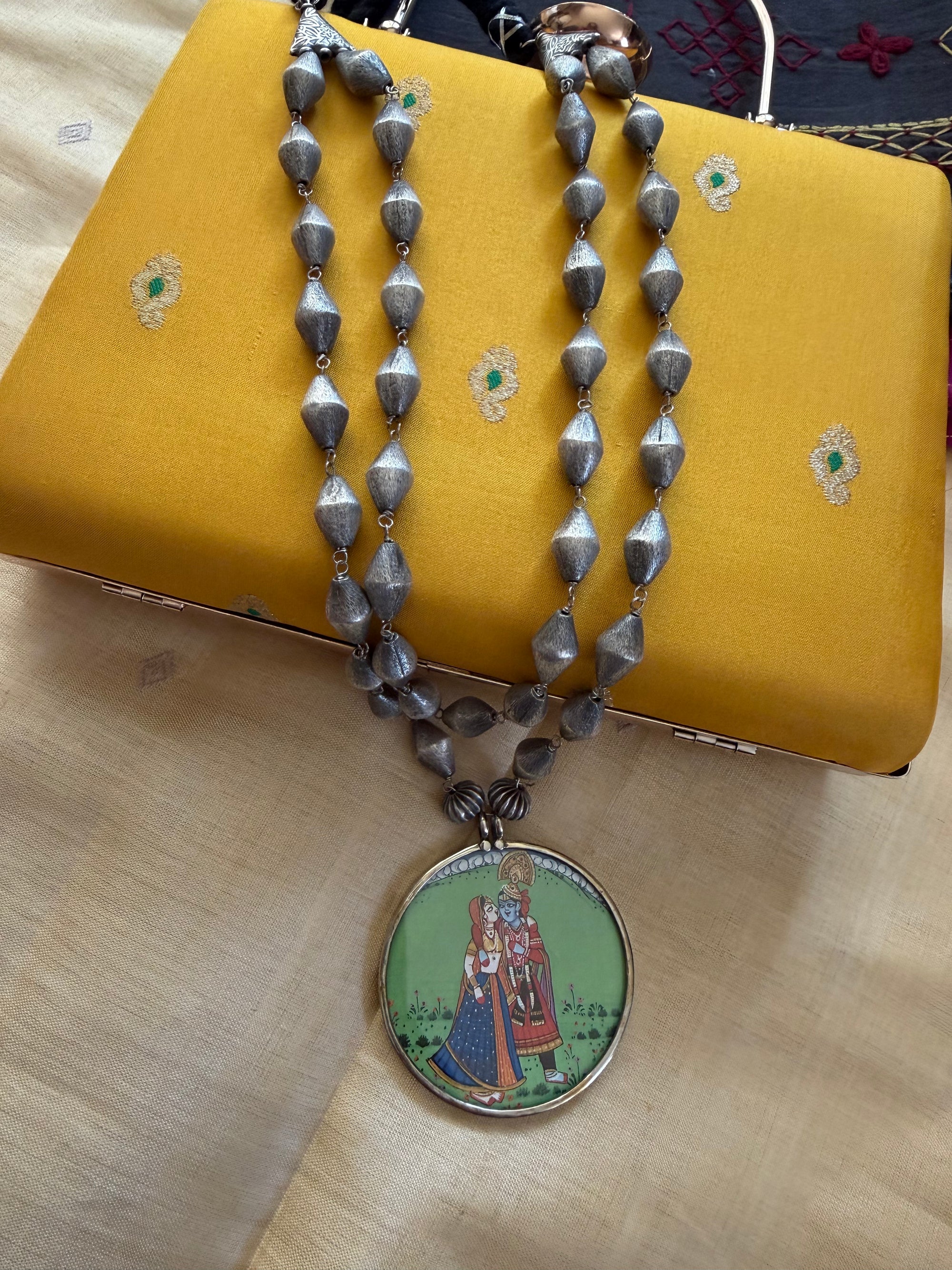 SILVER TONED JEWELRY : Double layered chain with Radha Krishna Pendant