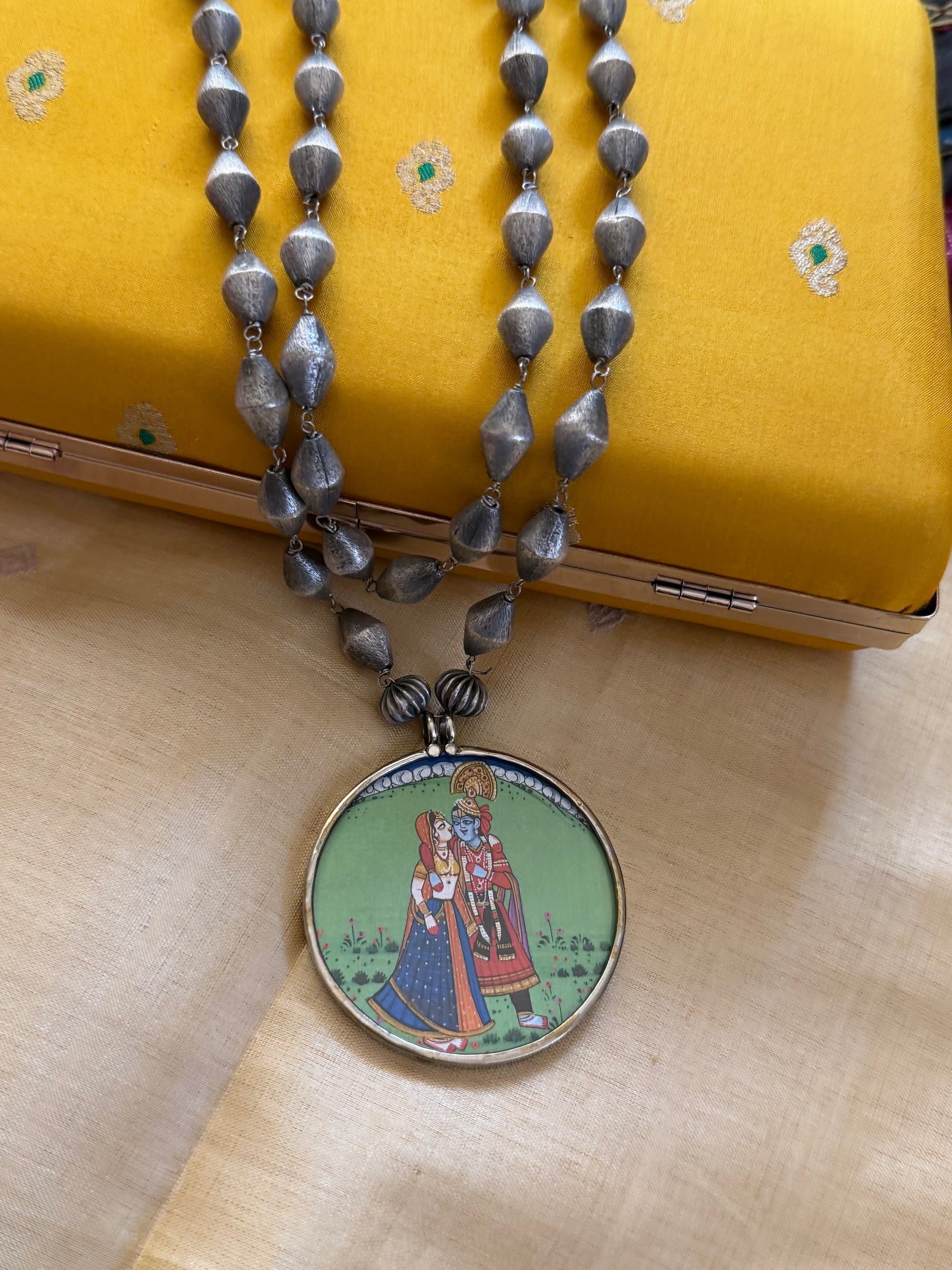 SILVER TONED JEWELRY : Double layered chain with Radha Krishna Pendant