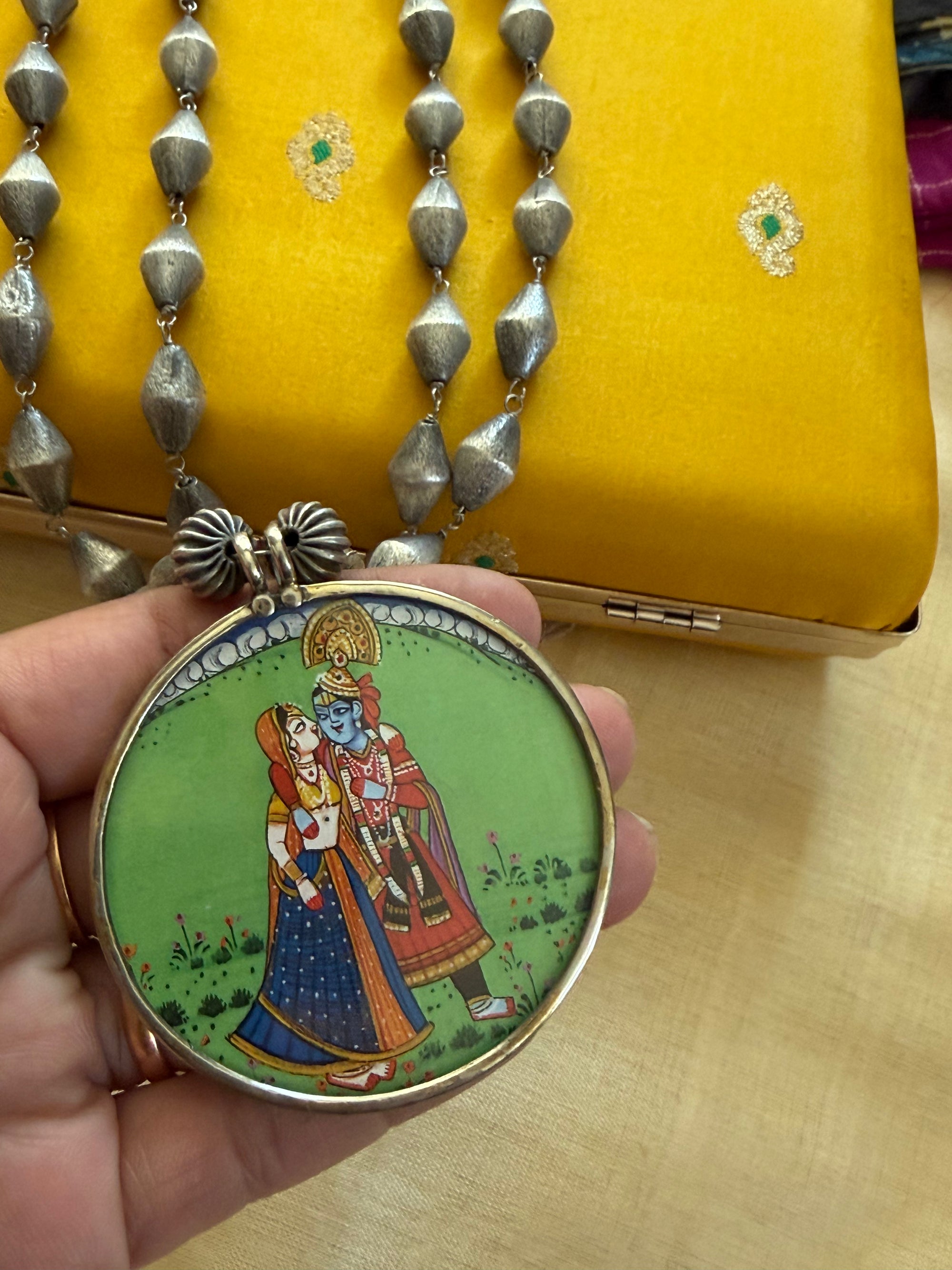SILVER TONED JEWELRY : Double layered chain with Radha Krishna Pendant