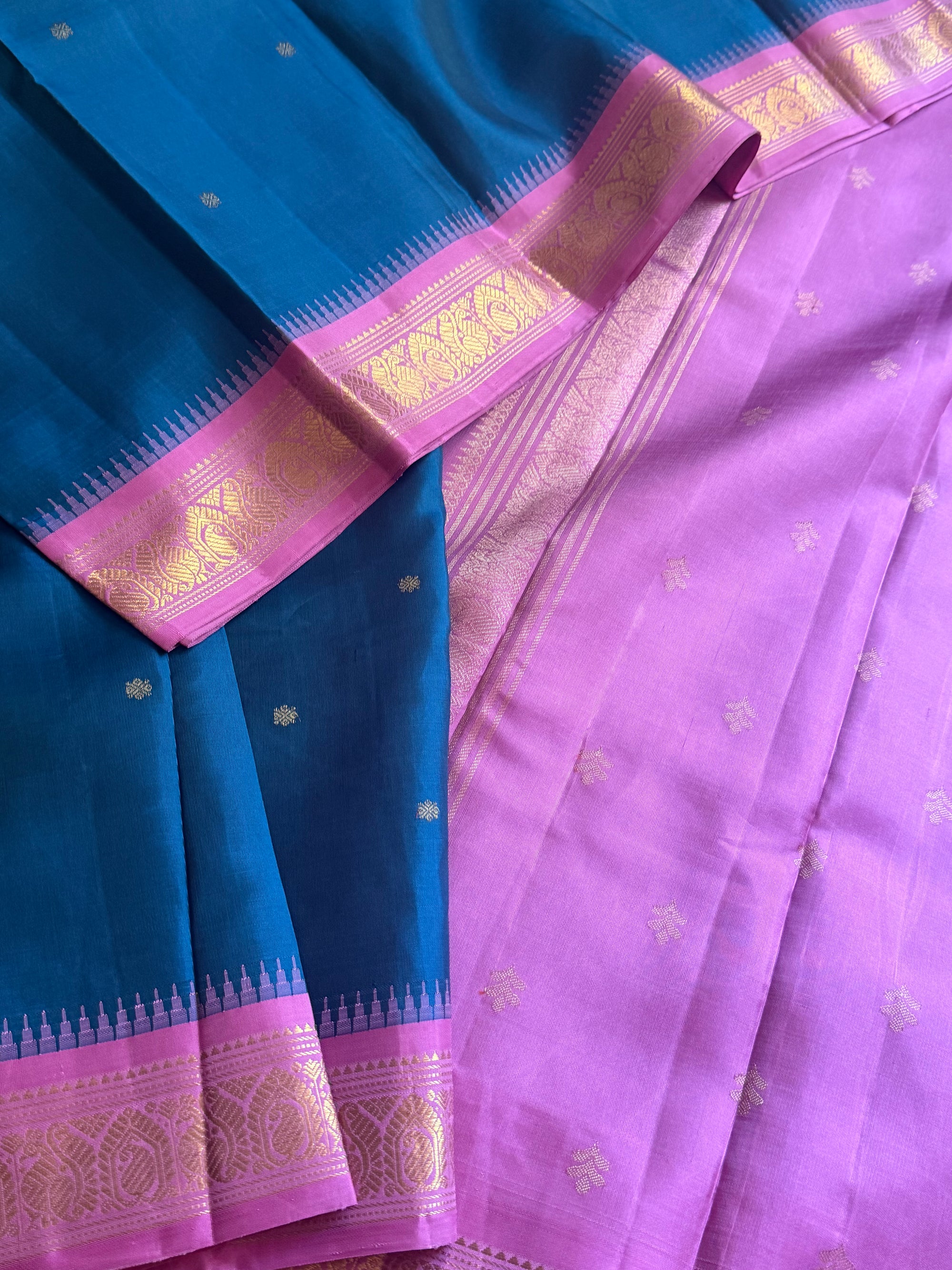 MAATHEY: Small border korvai Kanivaram (Teal blue + Mauve Pink)