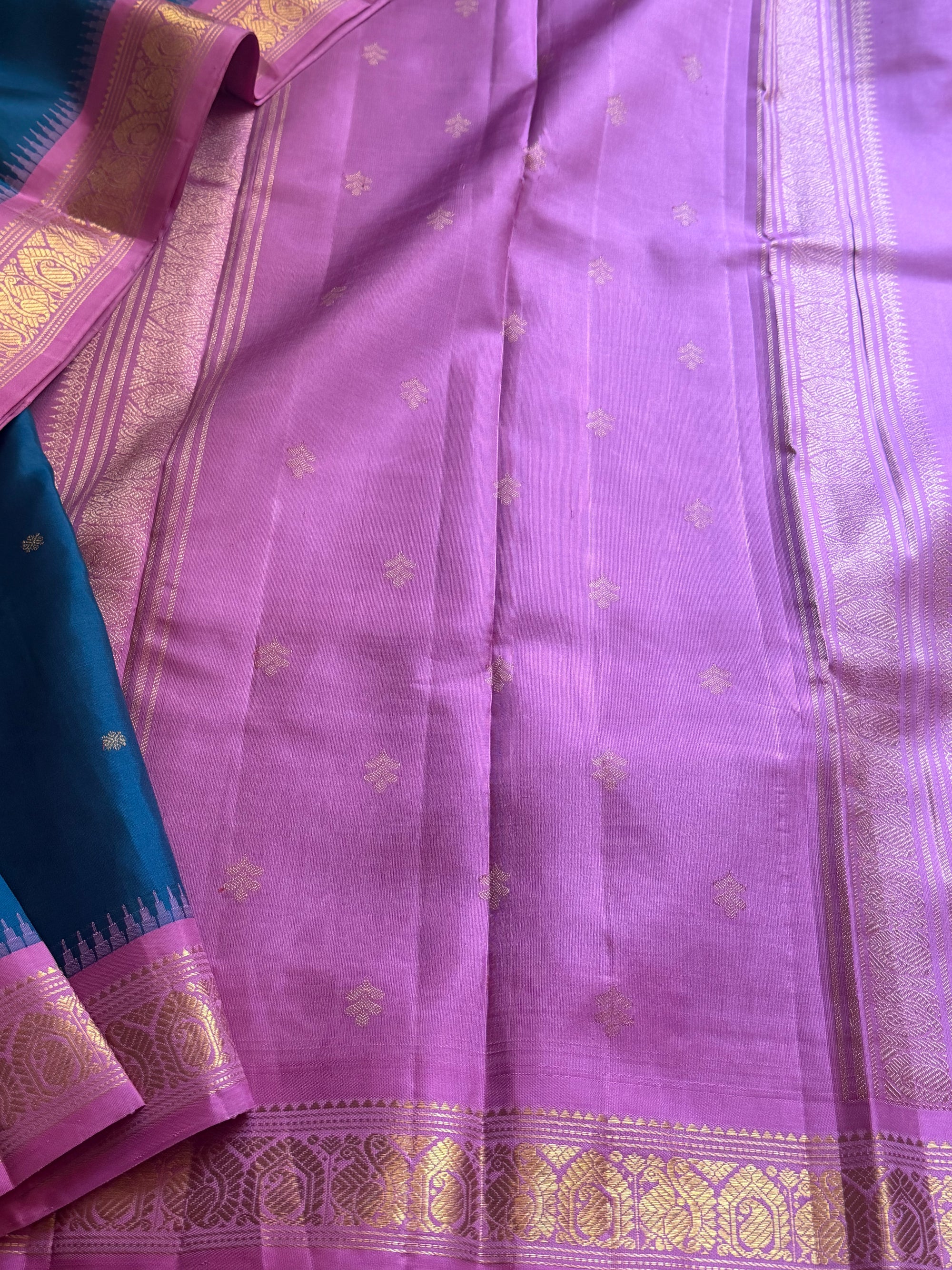 MAATHEY: Small border korvai Kanivaram (Teal blue + Mauve Pink)