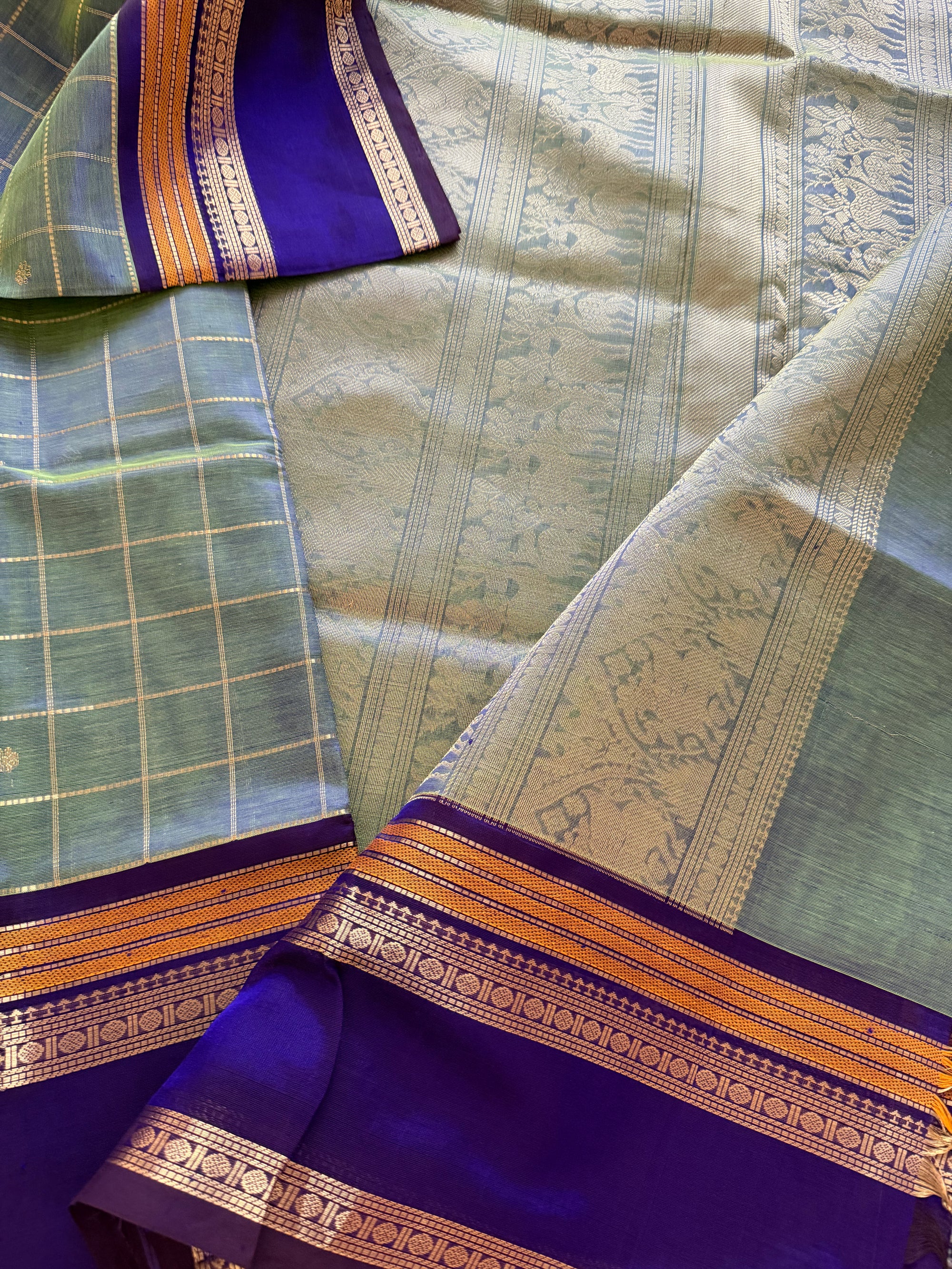 Silk Cotton :  Shot blue green Zari kattam