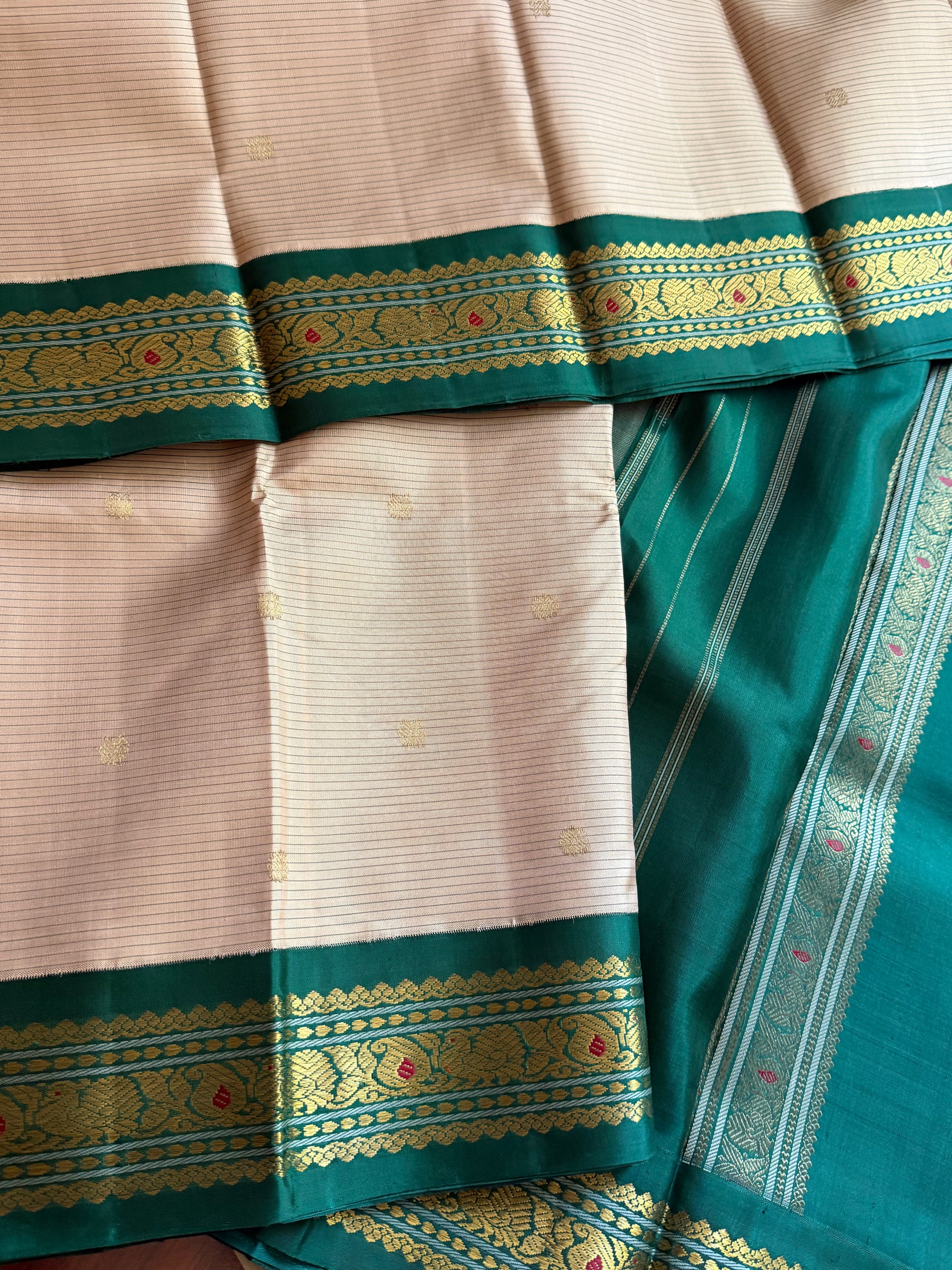 MYTHILI:  Korvai Kanjivaram Silk (Ivory + Offwhite / Teal Green)