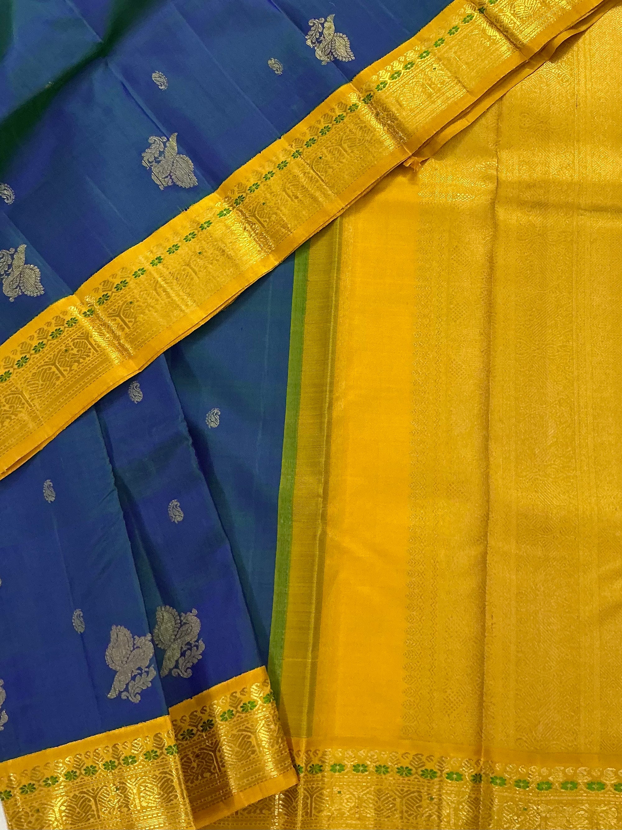 MYTHILI:   Korvai Kanjivaram Silk (Peacock blue with Beetu Buttas)
