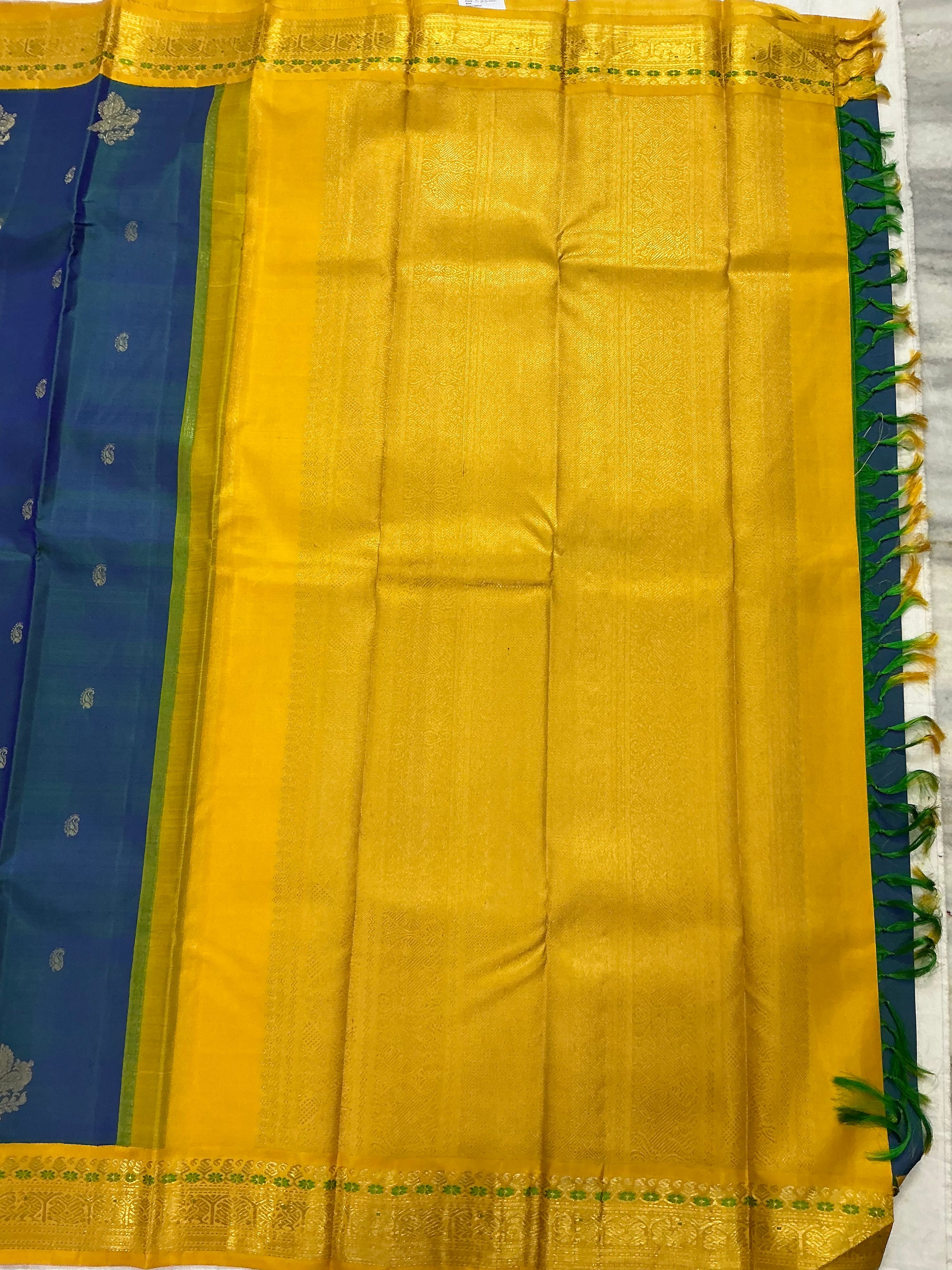 MYTHILI:   Korvai Kanjivaram Silk (Peacock blue with Beetu Buttas)