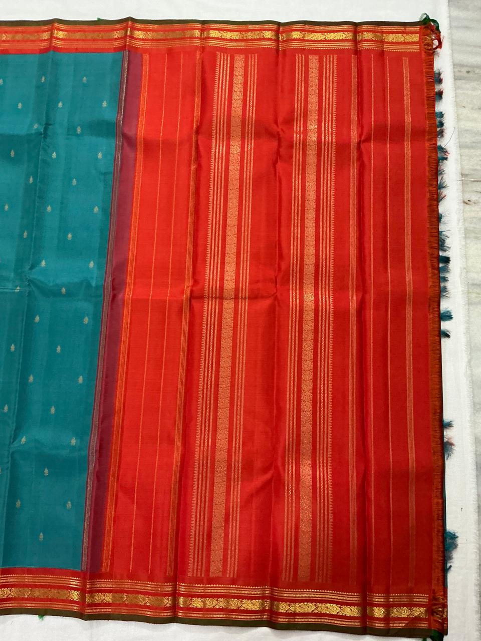 MAATHEY: Korvai Kanjivaram Silk (Jewel tone blue + Orange)