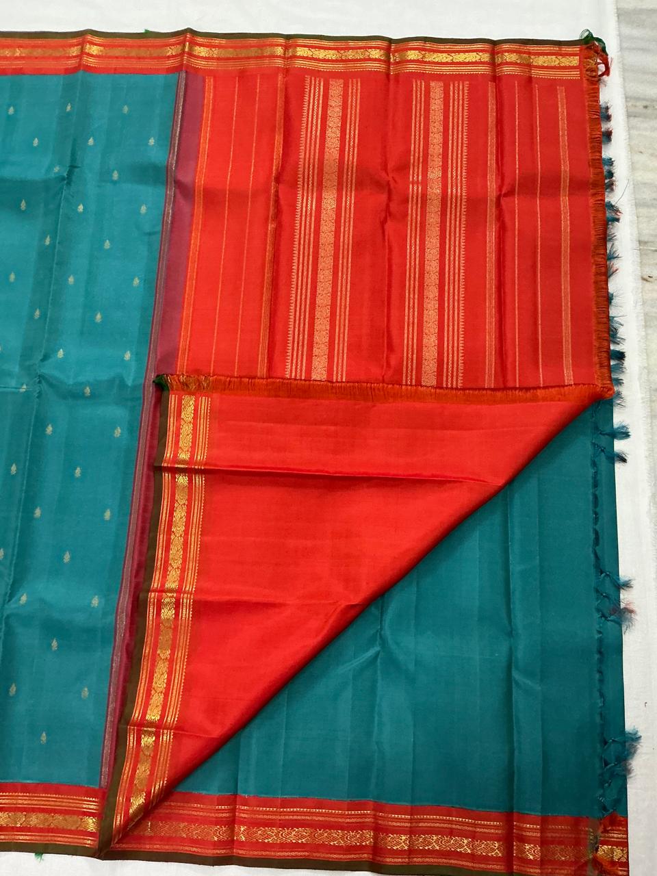 MAATHEY: Korvai Kanjivaram Silk (Jewel tone blue + Orange)