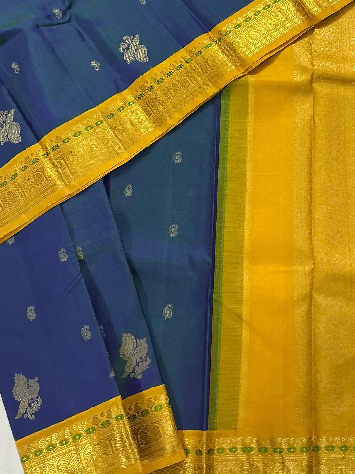MYTHILI:   Korvai Kanjivaram Silk (Peacock Blue Beetu butta)
