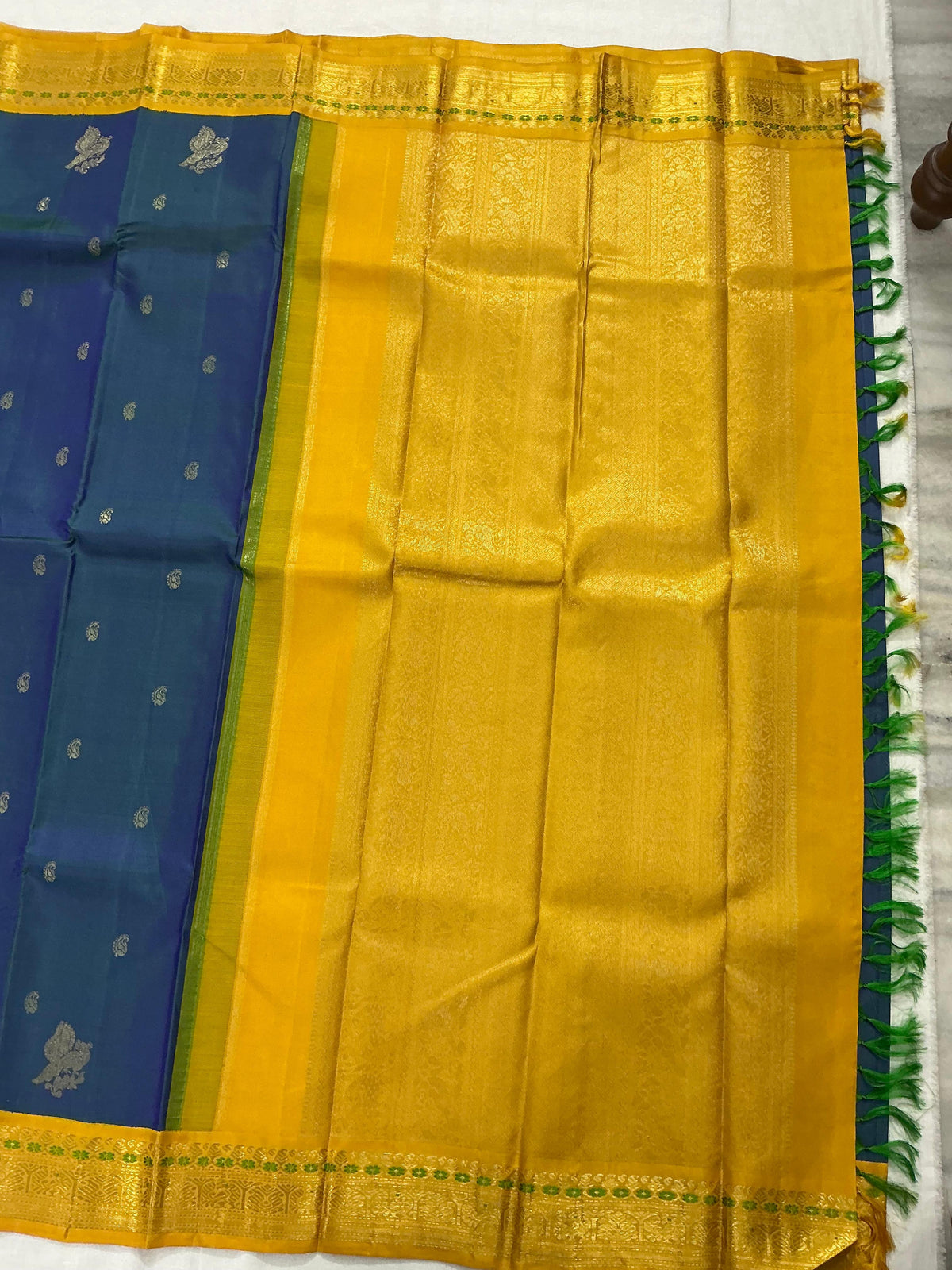MYTHILI:   Korvai Kanjivaram Silk (Peacock Blue Beetu butta)