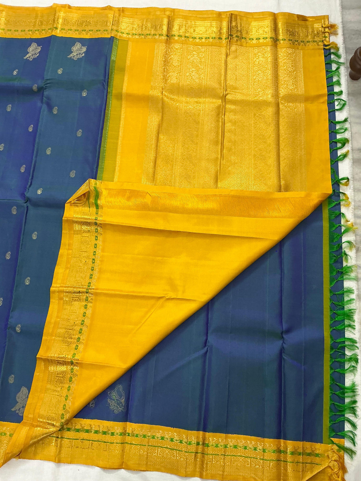 MYTHILI:   Korvai Kanjivaram Silk (Peacock Blue Beetu butta)
